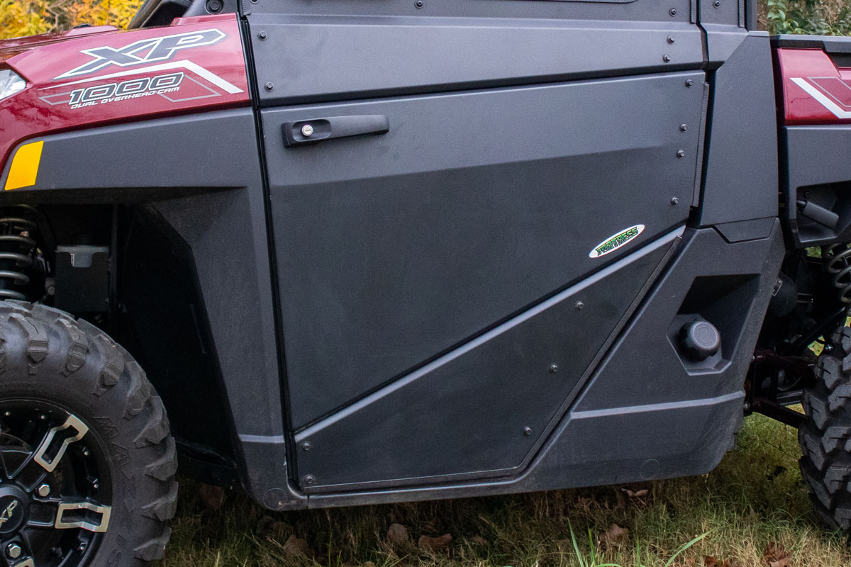 Image of an exterior handle for Fortress Pro's Convertible Doors on a Polaris